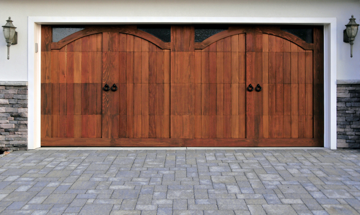 Gorgeous wooden garage doors with custom paved driveway. See my many other masonry pictures (clickHERE)