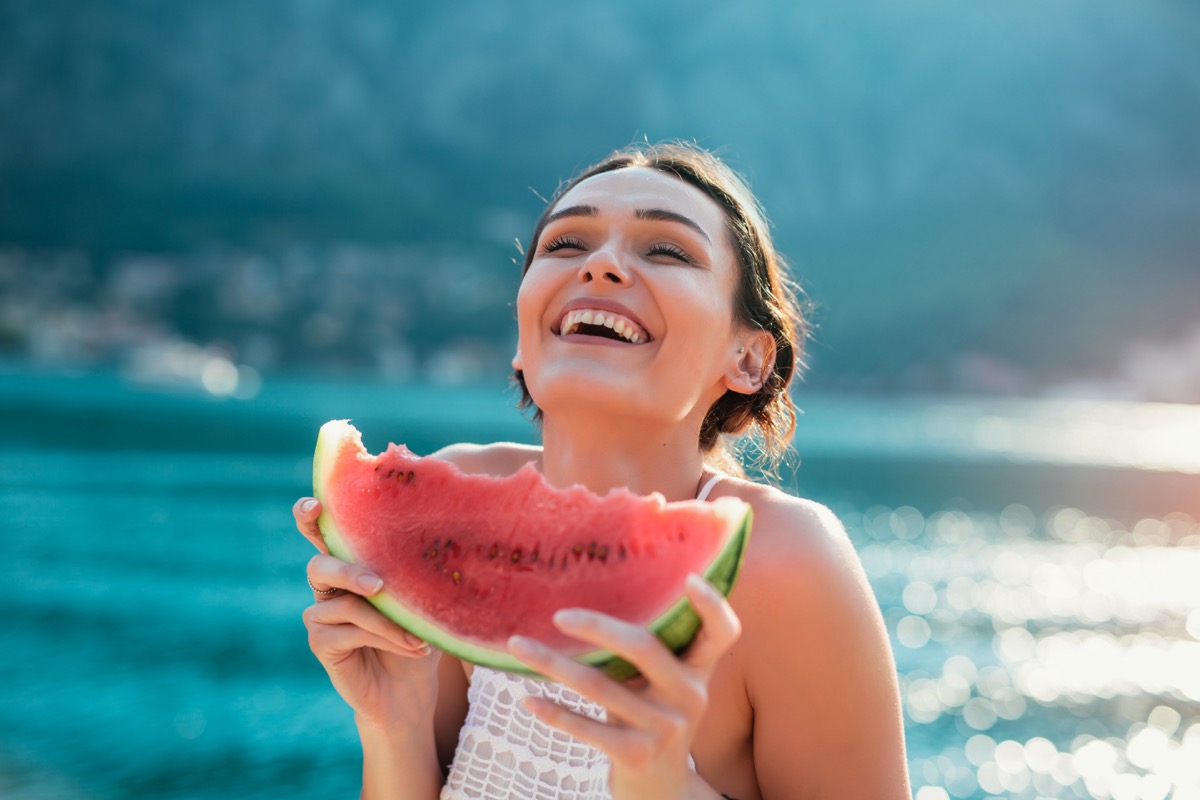 woman eating watermelon
