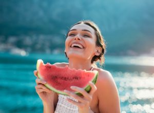 woman eating watermelon
