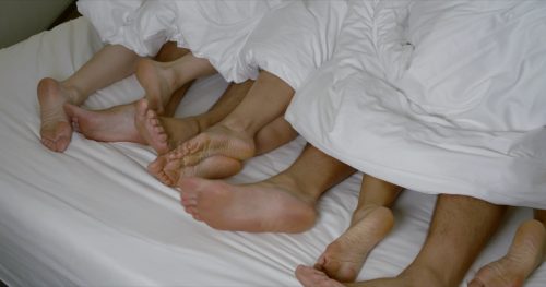 barefeet in bed