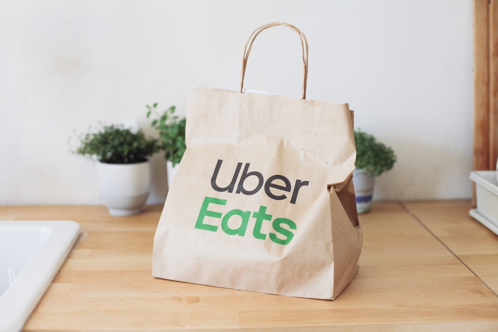 An Uber Eats bag on a desk