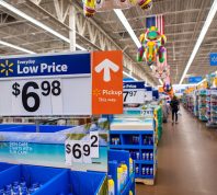 sign with Walmart prices in Walmart store