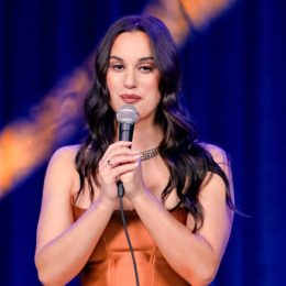 Hannah Berner doing stand-up comedy on Netflix.