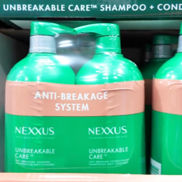 Closeup of Nexxus shampoo and conditioner in green bottles at Costco