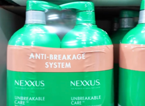 Closeup of Nexxus shampoo and conditioner in green bottles at Costco
