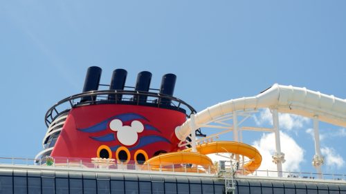 Nassau, Bahamas - April 9, 2024: Disney Wish is the newest ship to join the Disney Cruise Line family. The funnel of the ship features a mouse-eared silhouette.