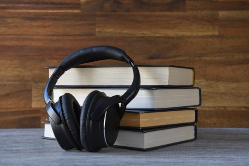 headphones and stack of books