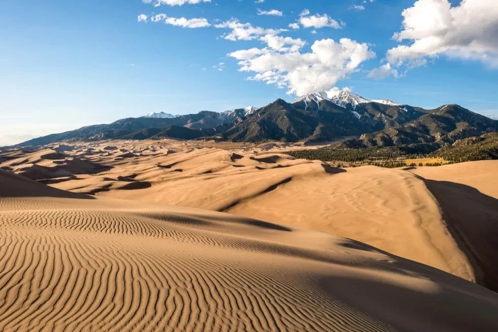 Sunset view of sand waves at the top of Great Sand Dunes, Great Sand Dunes National Park