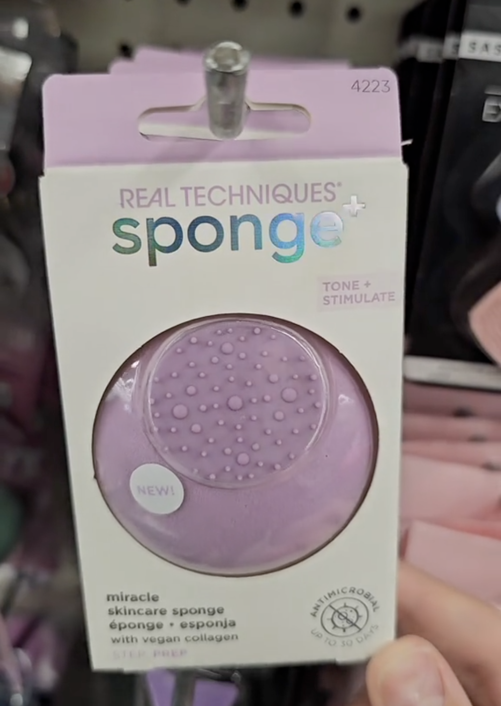 purple Real Techniques beauty blender sponge at Dollar Tree