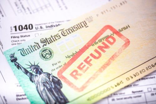 A United States treasury check with a tax refund.