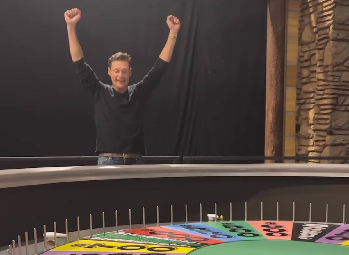 Ryan Seacrest on the Wheel of Fortune set.