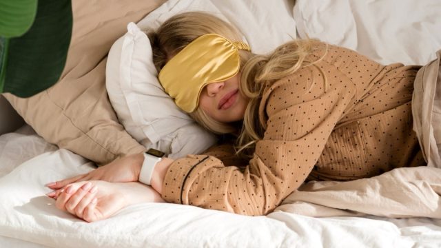 woman sleeping with eye mask on