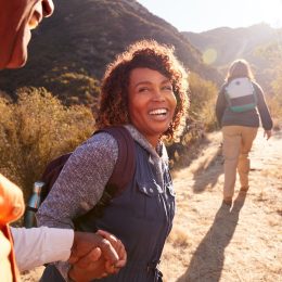 people hiking and smiling