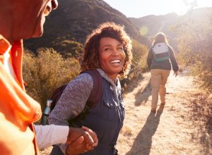 people hiking and smiling