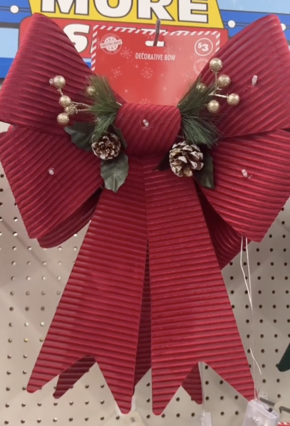 red decorative Christmas bow at Dollar Tree