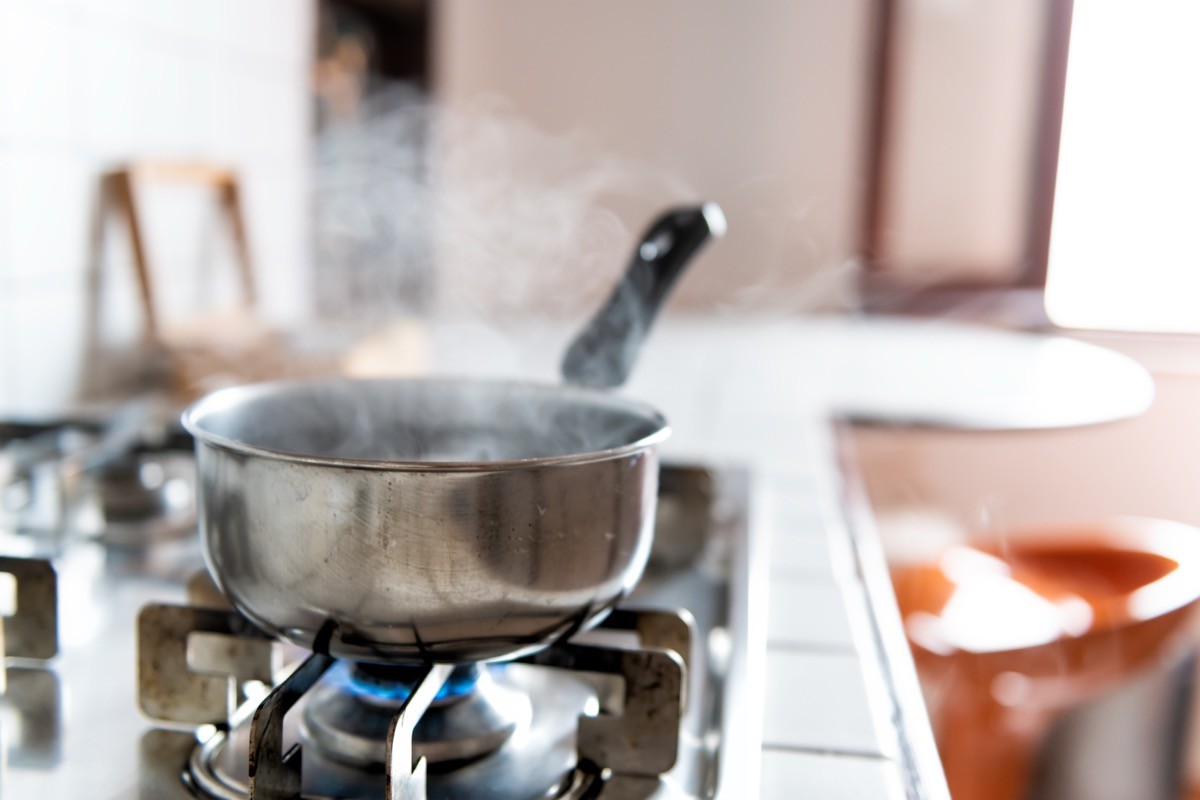 Closeup of a pot simmering on the stove