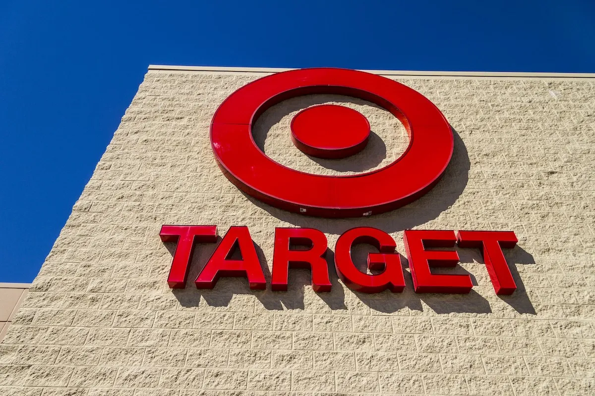Close up of a Target bullseye and store name on a store front.