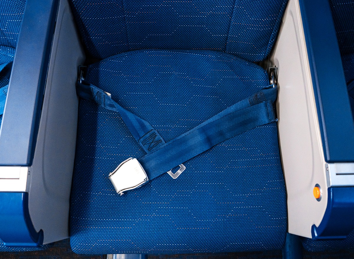 A seatbelt on an airplane seat