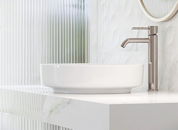 A bathroom sink, clear of clutter