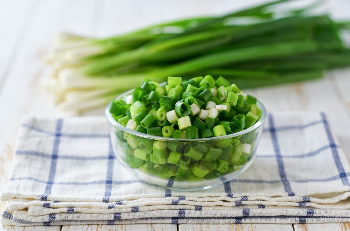 sliced and whole green onions