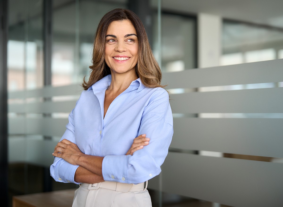 A well-dressed woman looking confident