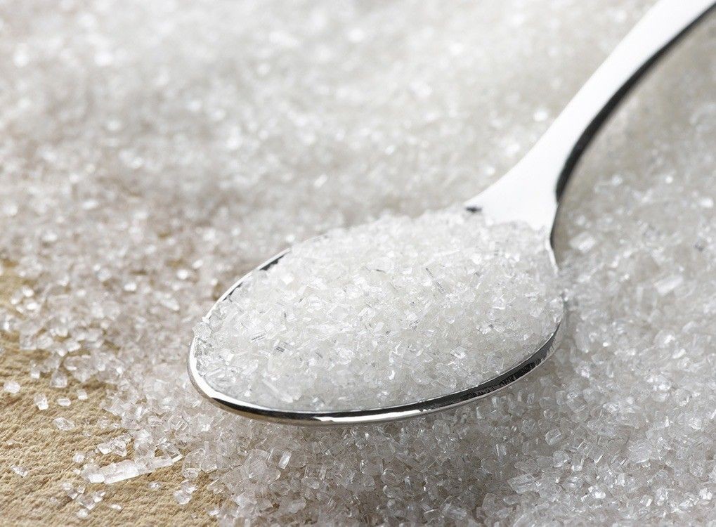 Sugar crystals on a spoon