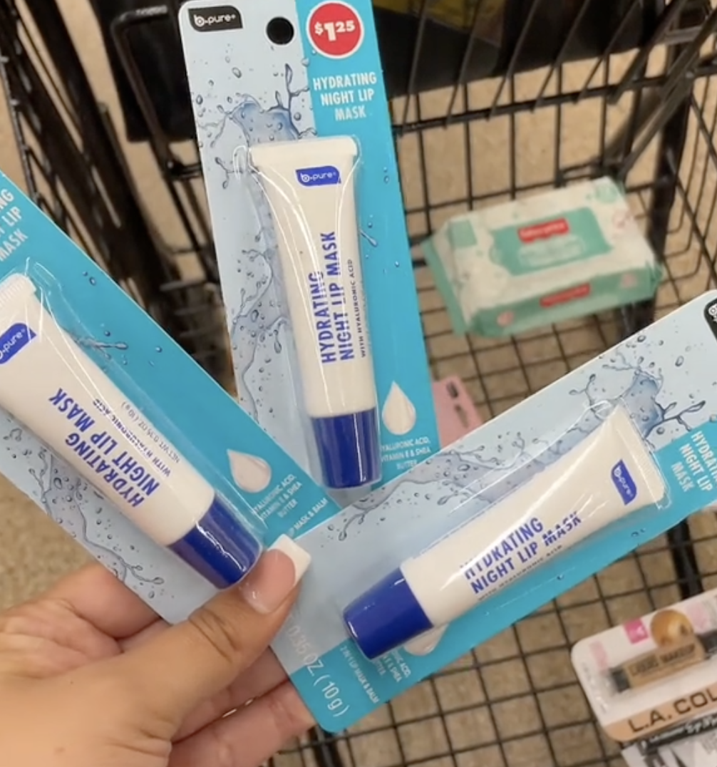 shopper holding up lip masks at Dollar Tree