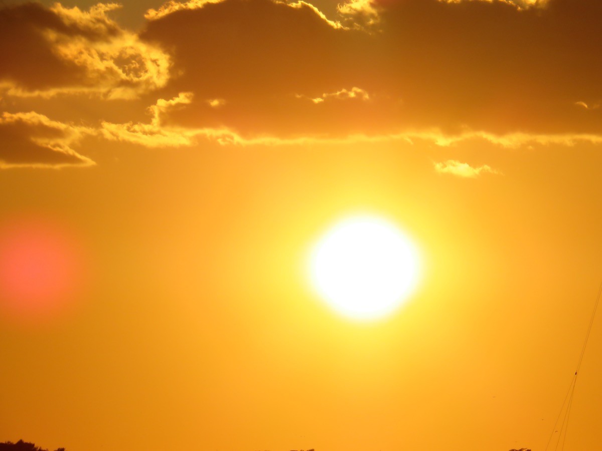 Bright sun in the sky