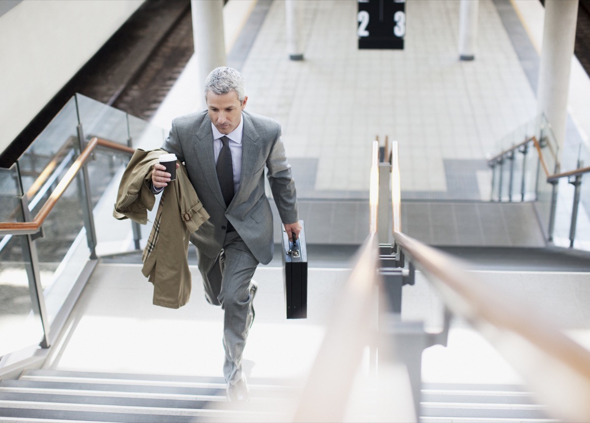 businessman walking up the stairs