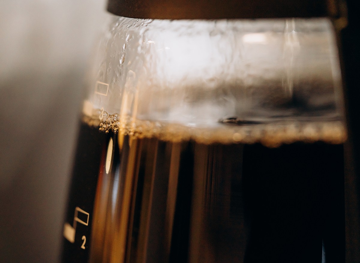 A closeup of a pot of brewed coffee