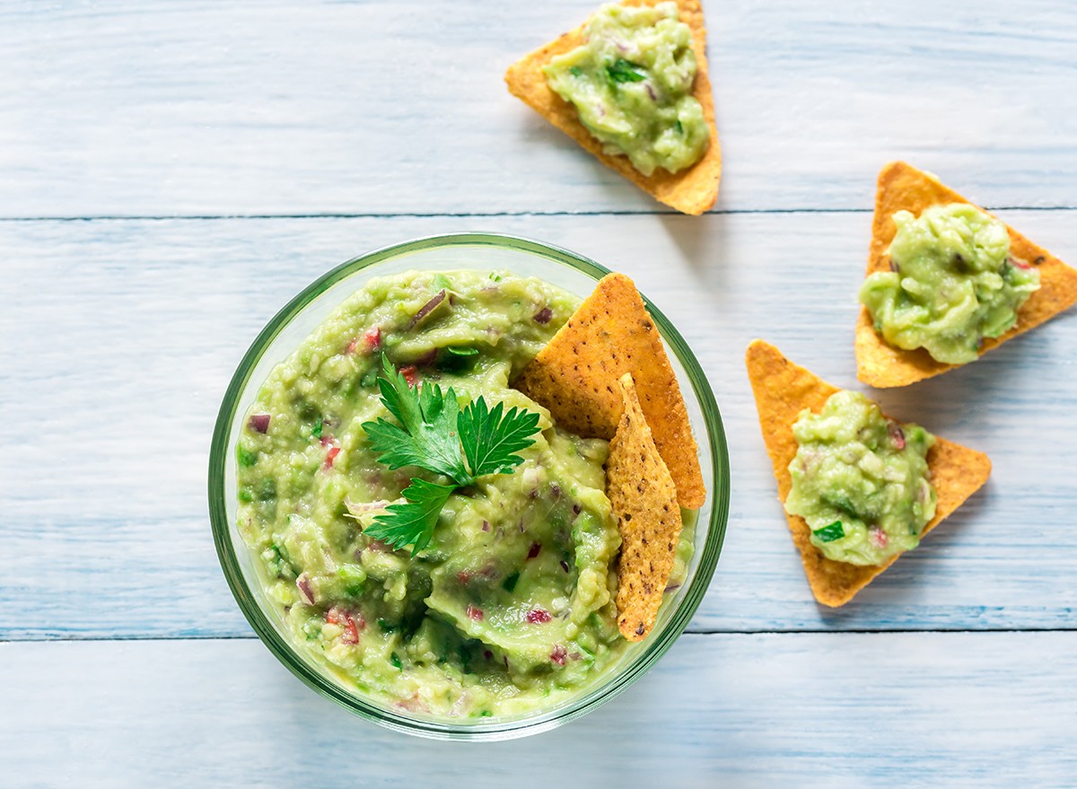 Chips and a small bowl of mashed avocado
