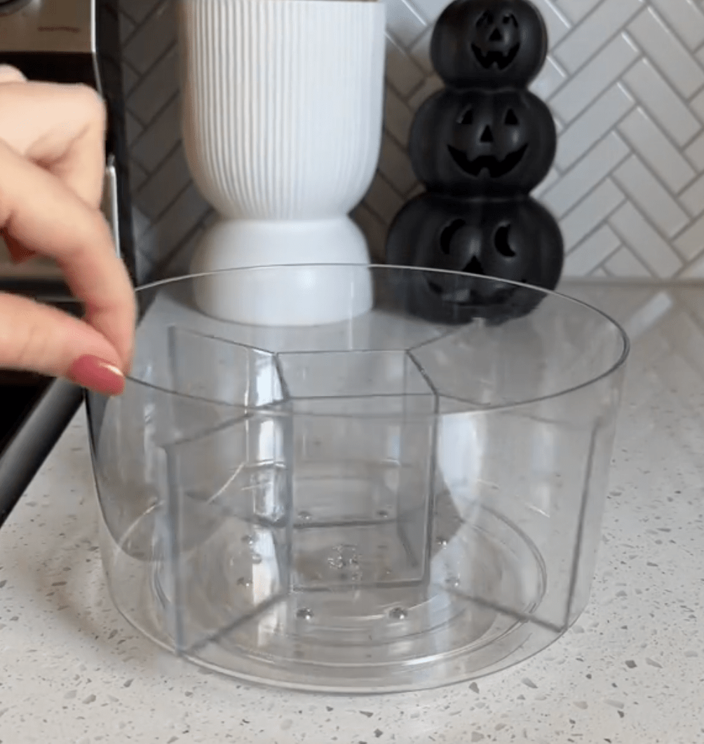 clear plastic lazy susan on a kitchen counter