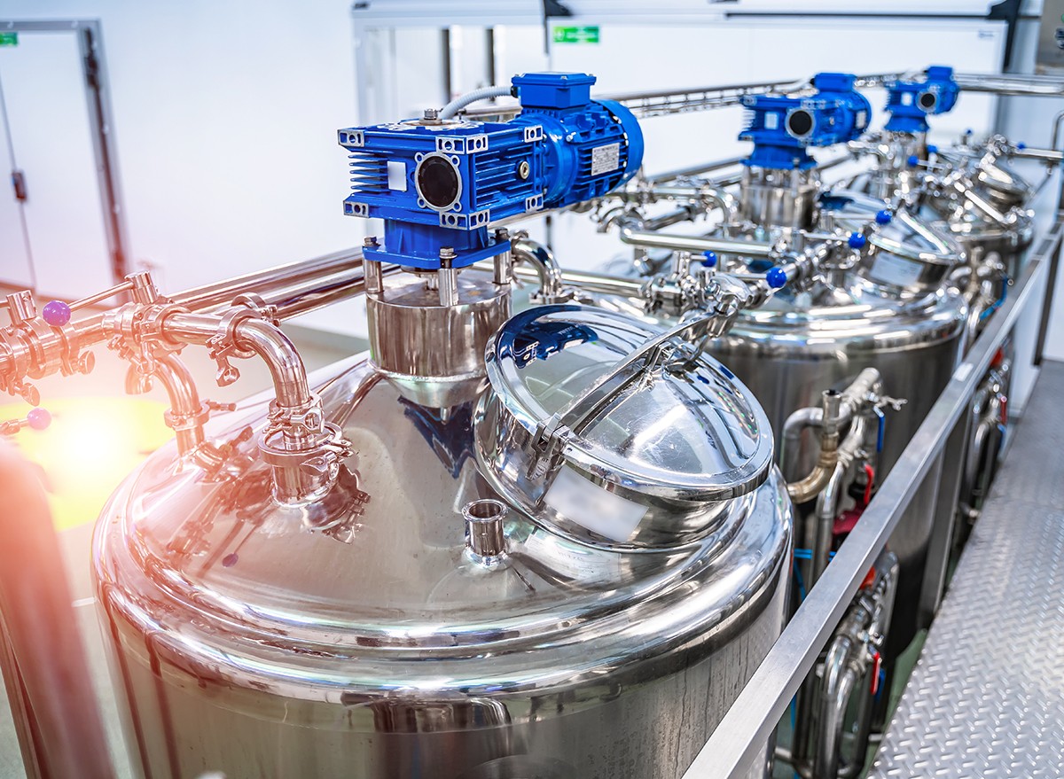 Dairy factory with milk pasteurization tank and pipes