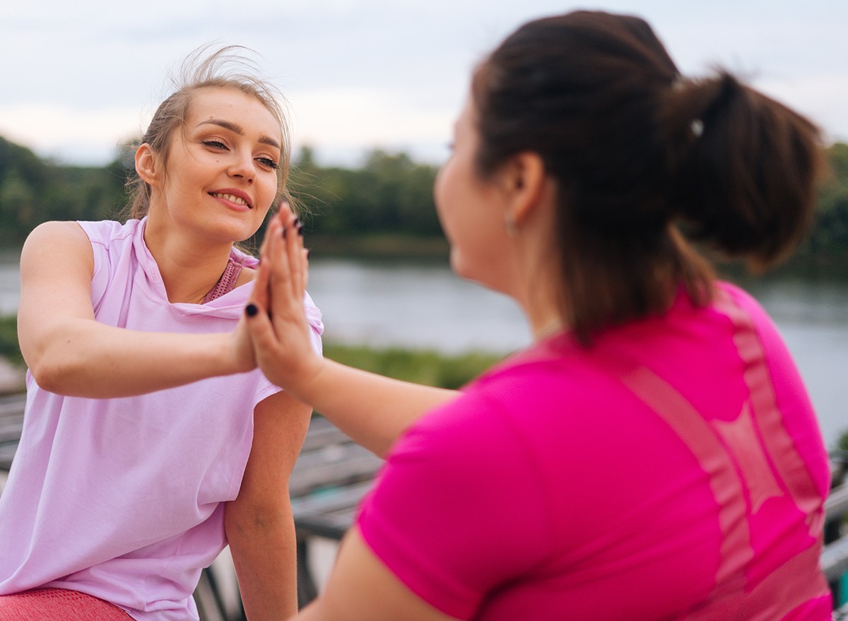 Two friends high-five