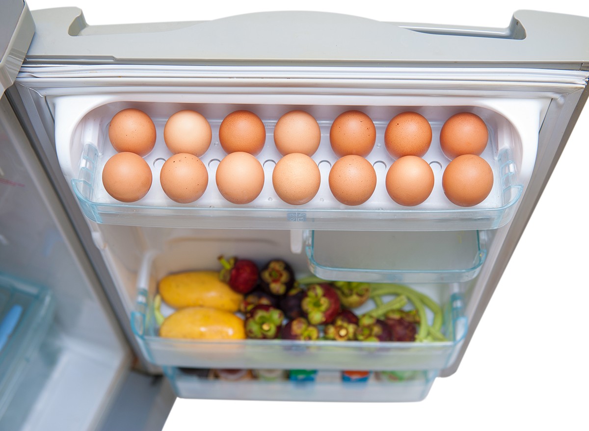 Eggs in the door of a fridge