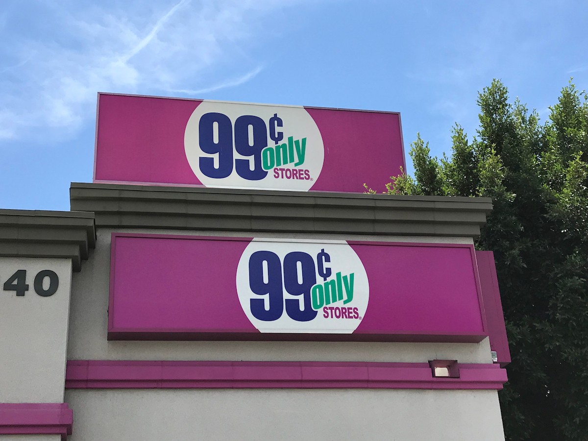 Double logo on the building facade of the 99 Cents Only store