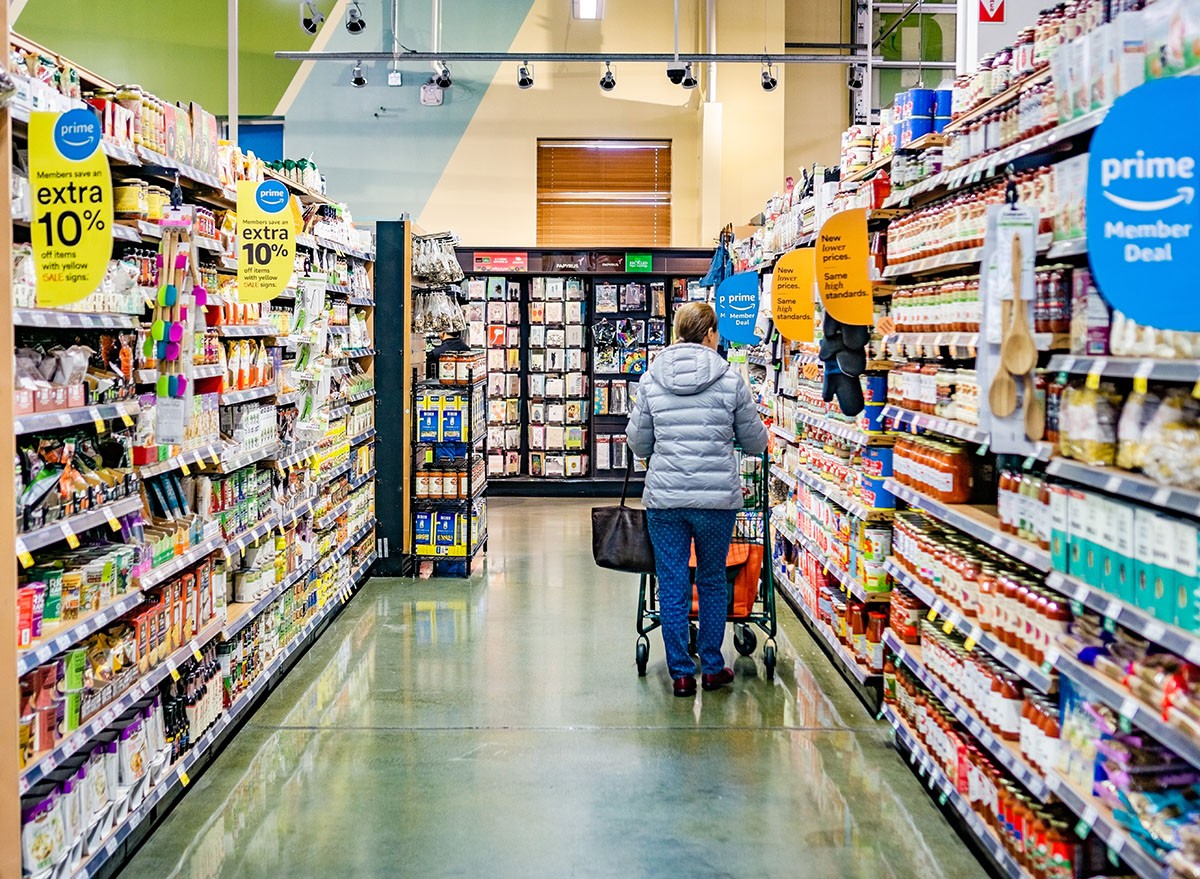 A woman shopping inside a Whole Foods store