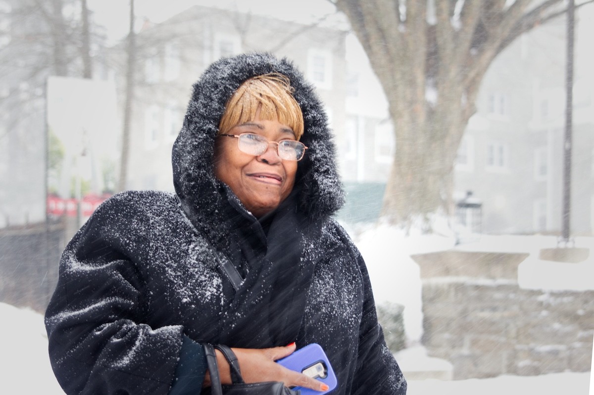 closeup of a woman outside on a snowy day