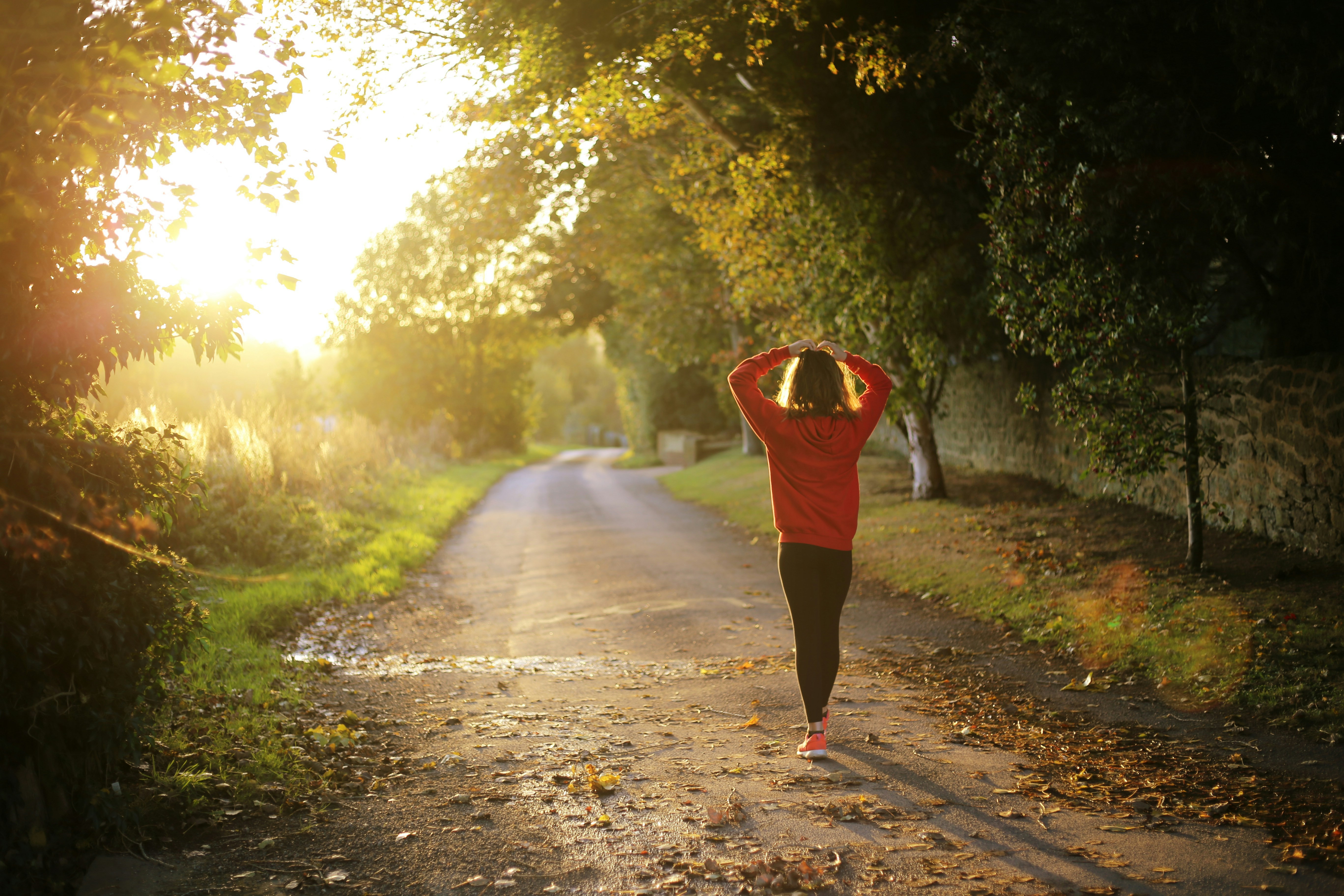 person takes a break during their busy day by going for a walk