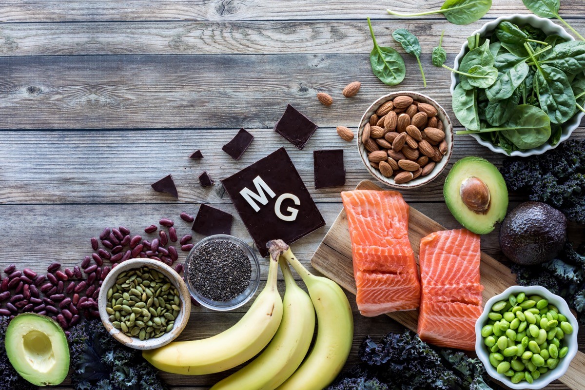 An assortment of food high in magnesium with the element symbol MG