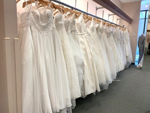 rack of wedding dresses at David's Bridal