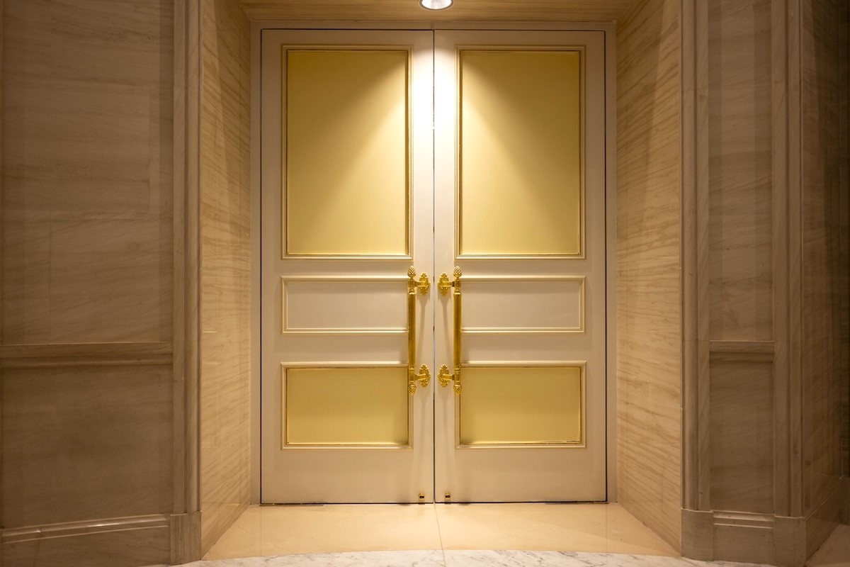 closeup of a house with golden doors