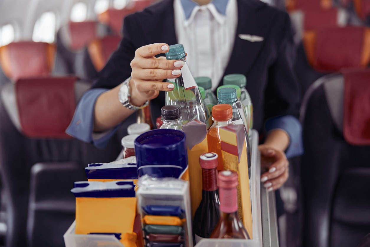 Flight Attendants Say Never Drink These 2 Beverages on a Plane—Here’s Why