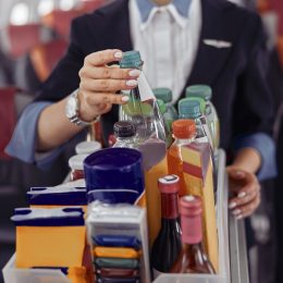 Flight Attendants Say Never Drink These 2 Beverages on a Plane—Here’s Why