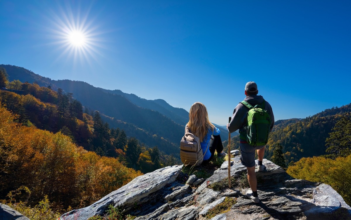 female and male hiker taking a break while hiking in Great Smoky Mountains National Park