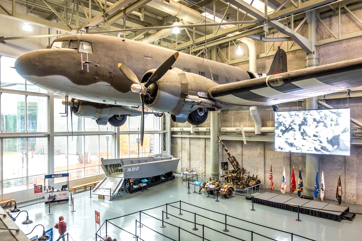 plane hanging from the ceiling in the National WWII Museum