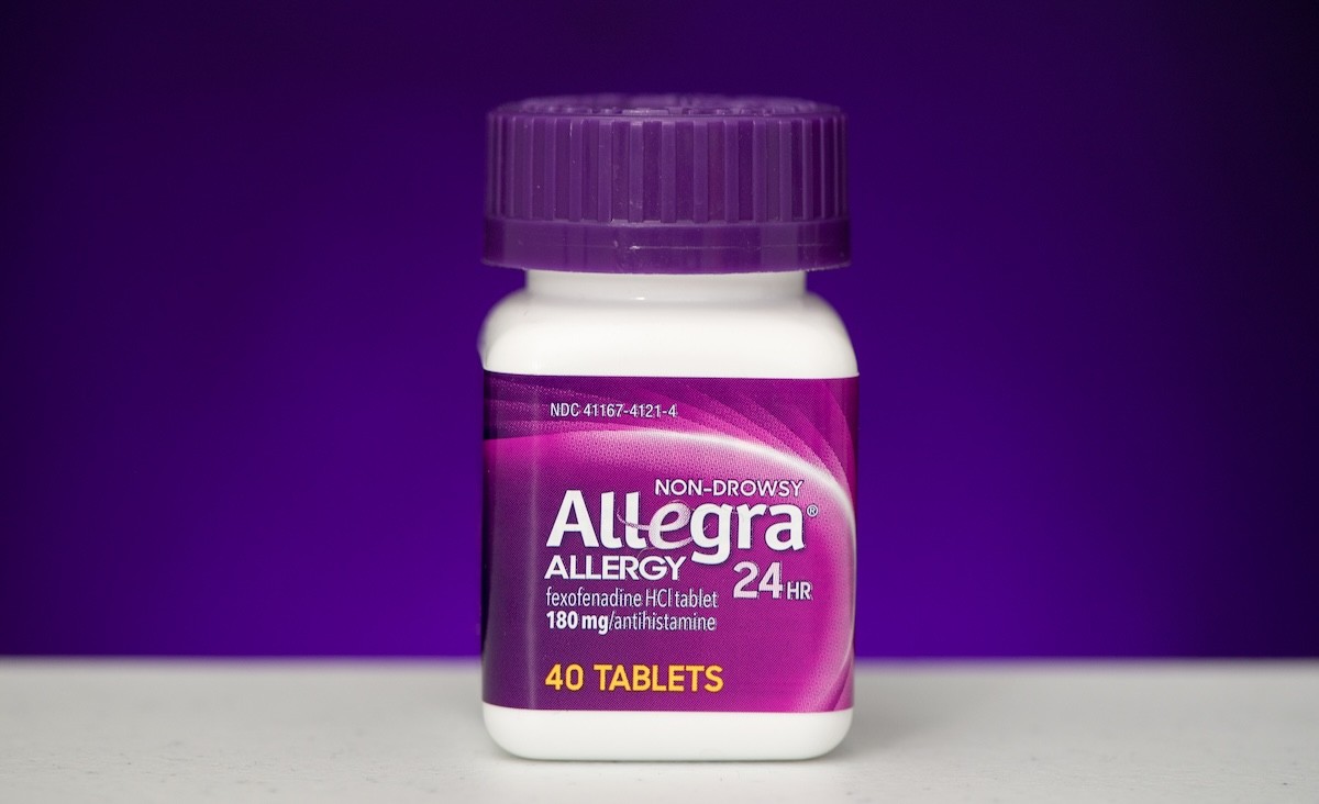 bottle of allegra on purple background