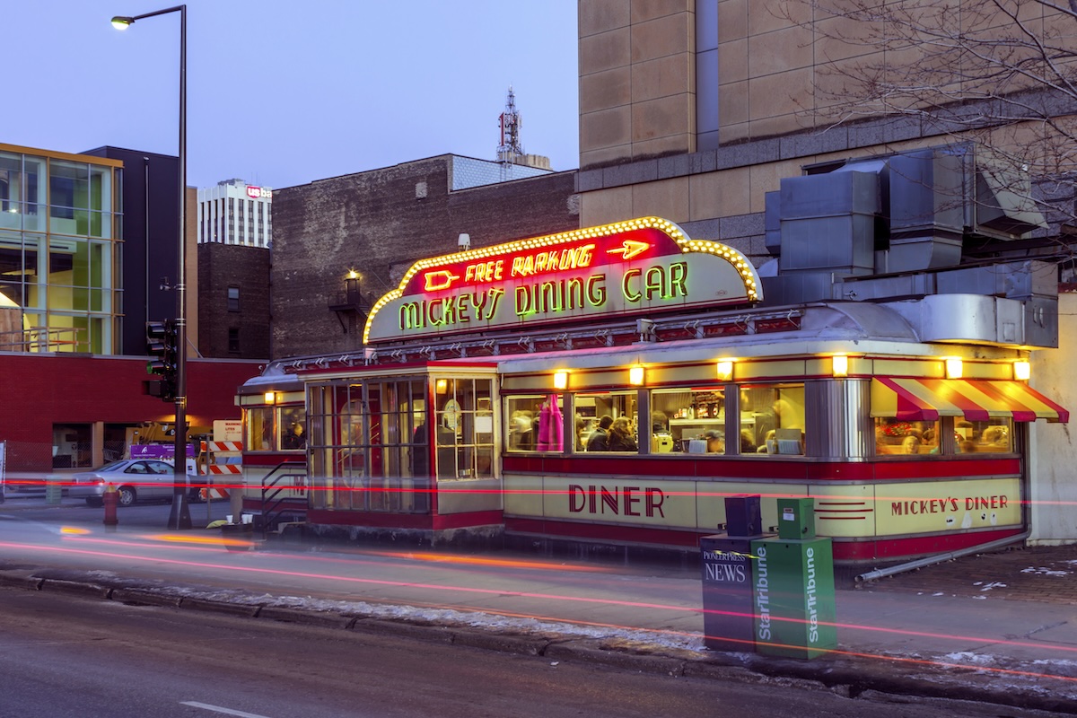 A Medium Shot of St Paul's Mickey's Dining Car with the First Building Sign in the Background