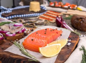 traditional Norwegian cuisine, with a piece of salmon in the foreground