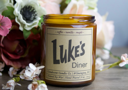 Candle on a floral background